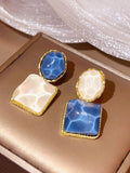 Asymetrical blue earrings