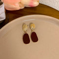 Maroon gold earrings