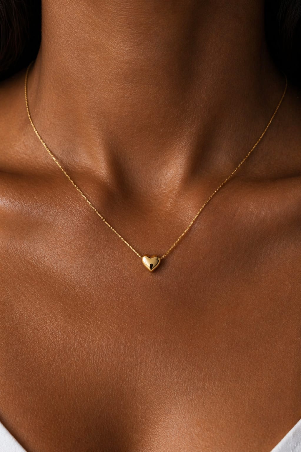 Gold heart pendant necklace